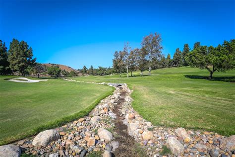 Mountain meadows golf. Course Description. Mountain Meadows Golf Course is located twenty-five miles east of Los Angeles, just one mile north of the 10 freeway, amidst the hills of the San Gabriel basin. The grounds are beautifully adorned with... 