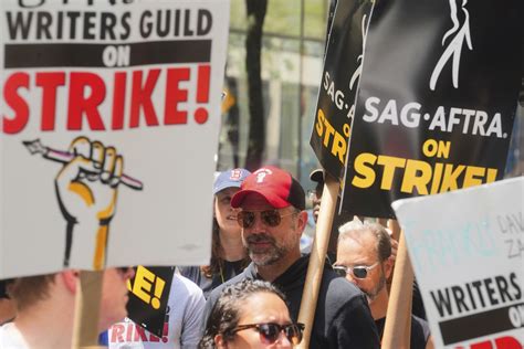 Movie and TV stars join picket lines across Hollywood, New York