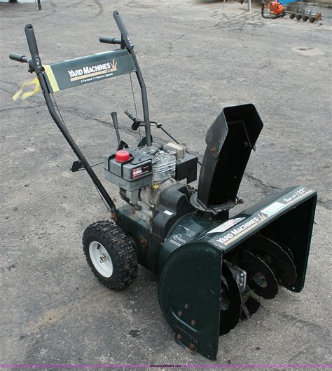 Mtd yard machine snow blower. Two-Stage Snow Throwers. Two-stage snow thrower model and serial number plate is located on the frame cover, between the wheels. Model number will begin with 31. Single-Stage Snow Throwers. Single-stage snow thrower model and serial plate is located on the units frame, near the belt cover. Model number will begin with 31. String Trimmers 