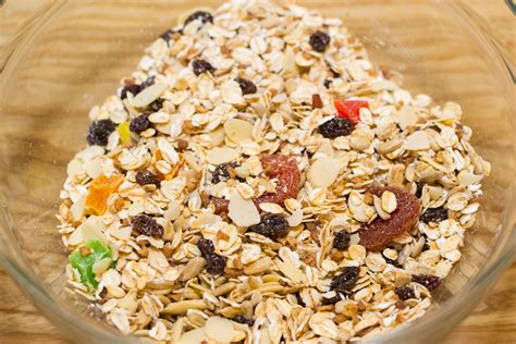 Muesli. How Muesli vs Granola is made is the biggest distinction. Granola is baked and typically includes additional sweeteners along with dried fruits, such as honey or sugar, while muesli is uncooked, fresh, and sweetened entirely with dried fruits. Though granola appears to have a higher calorie content than muesli, both are equally high in sugar ... 