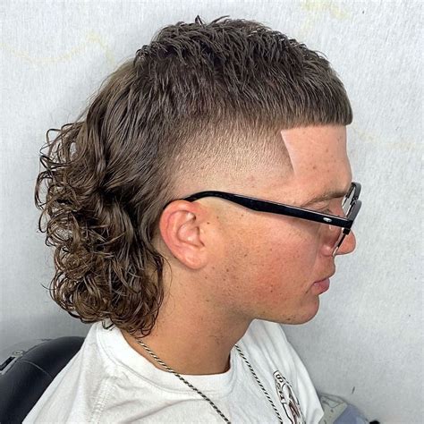 Mullet fades haircut. Burst Fade. The burst fade is a type of fade haircut that curves around the sides and into the back, leaving your tapered hair longer at the neck. Burst fades are rounded and have a similar profile to the drop fade. Most guys get the burst fade mohawk or a mullet since the cut naturally caters to these hairstyles. 