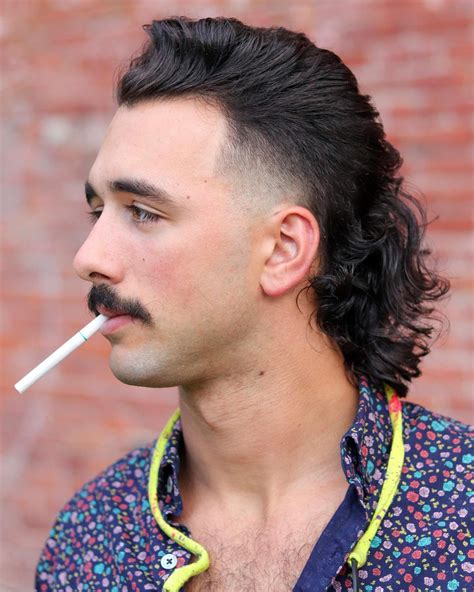 Bid farewell to outdated mullet clichés because we’re flipping the script on traditional expectations. These styles are here to challenge norms and make your hair the ultimate style statement. In this article, we’ll explore 30 modern mullet hairstyles for men this season and give you all the tips you need to style them like a pro.. 