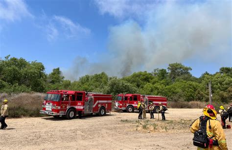 Multi-acre brush fire burns in Tijuana River Valley