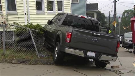 Multi-vehicle crash in Dorchester leads to pickup truck driver striking house