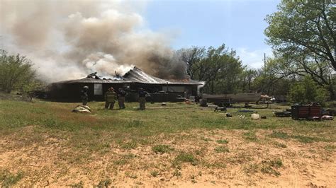 Multiple crews respond to house fire on Sand Creek Road