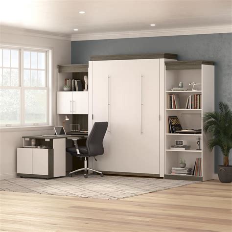 Murphy bed office. Description. The Korte Murphy Bed turns one room into two! It transforms any room in your home into a guest room at a moment's notice! The pedestal desk has adjustable shelves in the hutch, a 20x66 desktop, and a 3-drawer pedestal with a roll-out dictation tray. The pedestal desk and hutch can be installed on either side of the bed. 