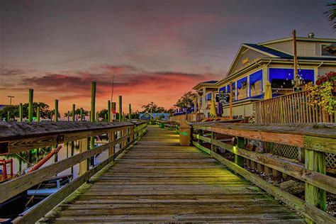 Murrells inlet boardwalk. The Boardwalk Beach Café offers finger foods like burgers, hotdogs, and fish baskets. Details. Location: 3500 North Ocean Boulevard, North Myrtle Beach, SC. ... In 2019, the Murrells Inlet-based Wicked Tuna opened a second location on the top two floors of the 2nd Avenue Pier. The second-floor features floor-to-ceiling windows with views of ... 