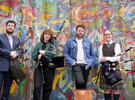 Musicians with bagpipes set record breaking performance showcasing music by AC/DC