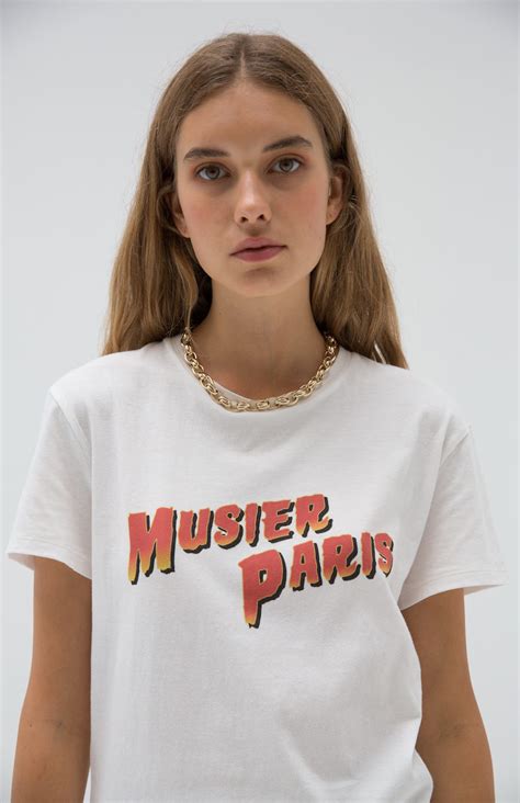 Musier paris. Black jersey top with appliqué flowers on straps. MUSIER Paris Made in France for eco-responsible and ethical fashion Free delivery from 150€ in France and 250€ everywhere else. 