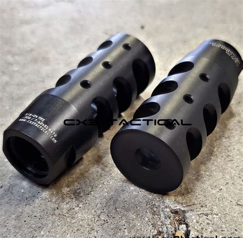Muzzle compensator.  This aluminum . 308 compensator muzzle device with a 5/8x24...