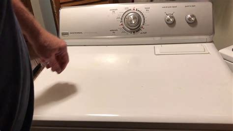 My Maytag front load washing machine say LOC and shows a key symbol. Please help I've only had the machine 24hrs. ... Maytag front load dryer model MED8630HW2 shows Loc with key. ... Loc with key symbol machine won't start just goes blank screen .... 