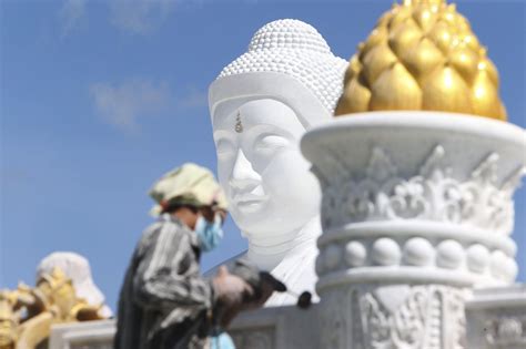 Myanmar’s generals unveil giant Buddha statue as they seek to win hearts and minds during civil war
