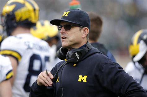 NCAA investigating allegations of sign-stealing by Michigan. Harbaugh denies knowledge, involvement