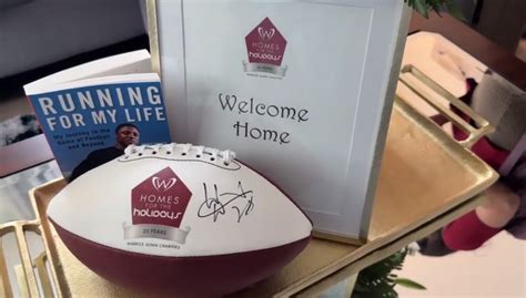 NFL legend Warrick Dunn gifts Miami single mother with homeownership dream before the holidays