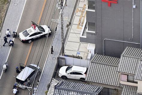 NHK television reports Japanese police have captured a gunman who holed up at a post office and rescued an employee