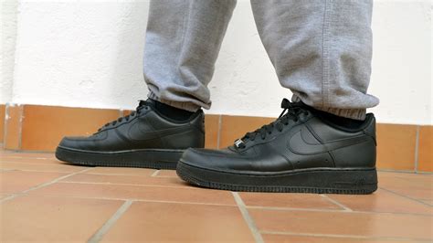 NIKE AIR FORCE ONE BLACK ON BLACK LOW on feet