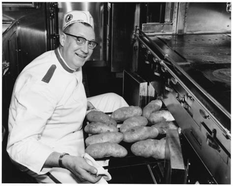 NORTHERN PACIFIC STATUETTE WITH GREAT BIG BAKED POTATO