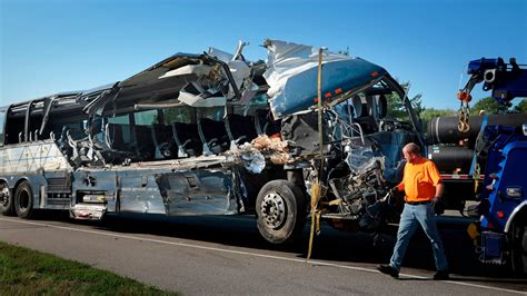 NTSB looking at risk parked semis posed to Greyhound bus in fatal Illinois accident