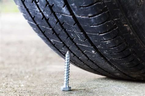 Nail in tire. Oct 30, 2019 · Tire punctures can often be repaired but there are limitations. If the puncture is greater than 1/4-of-an-inch in diameter, it’s better and safer to replace the tire. The most common cause of tire punctures is nails, and if the nail is small enough, it might not even penetrate the tire tread. Large nails, such as roofing nails, however, can ... 