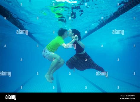 Naked asian girls kissing in a pool. Things To Know About Naked asian girls kissing in a pool. 
