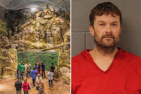 Naked man arrested after doing 'cannonball' into Bass Pro Shop tank in Alabama: police