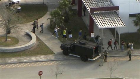 Students are reunited with friends and family after a shooting at Highland High School on May 11, 2018, in Palmdale, California. Fake school shooting threats inundated south Florida schools during .... 