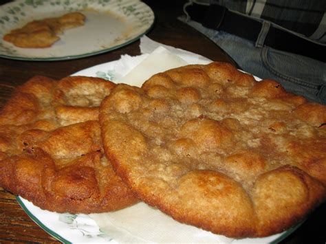 Native american fry bread recipe. Mix all dry ingredients thoroughly. Add water. Knead until soft, then set aside for one hour. Shape into small balls. Flatten each ball into a circle with or rolling pin or by hand. Fry in a skillet half-full of oil until golden brown on both sides. Hint- The magic is in frying the bread quickly! The hotter the oil, the less time it takes to ... 