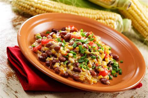 Native American Foods prepared according to the recipes included in this article. (A) Succotash is based on boiled sweet corn and beans, and is still a popular food in the Southern USA. (B) Bean bread is corn bread with beans and can be quickly prepared to make a highly nutritious meal or side dish.. 
