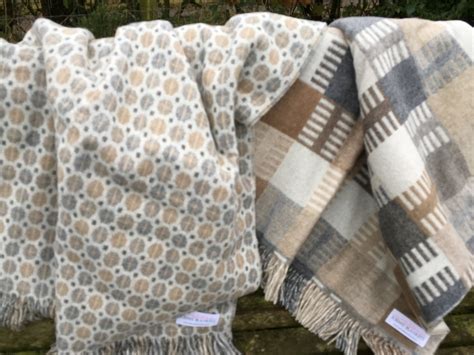 Natural fiber throw blankets.  as is normal or to be expected; ordinary or...
