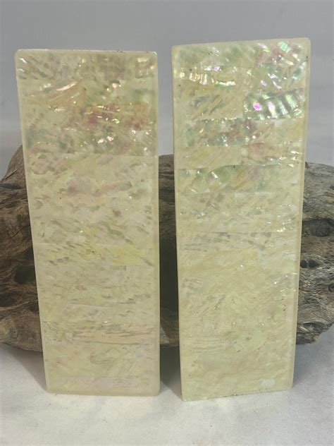 Natural knife scales.  1.  Hence: Not processed or refined; in the same statre as that ex...