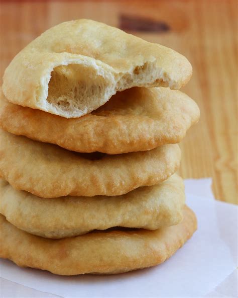 Navajo frybread. Navajo Fry Bread recipe Ingredients. 500 g flour; 1 teaspoons salt; 1.5 tablespoons baking powder; 1.5 or more cups warm water; 3 tablespoons vegetable oil; Vegetable oil for frying; Method. In a large bowl, mix together the flour, salt and baking soda. Make a hole in the middle of the mixture and add the warm water little by little until you ... 