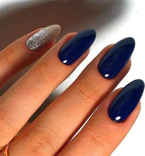 This blue almond nail design is so pretty! @a
