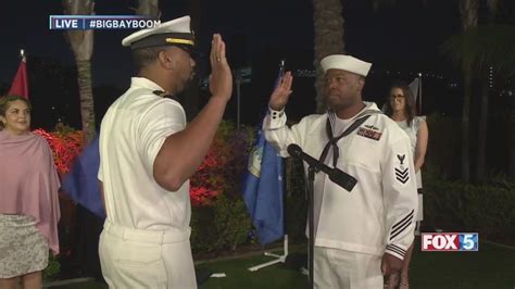 Navy sailor of 16 years reenlists before Big Bay Boom