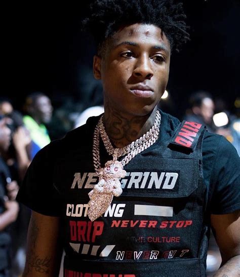 3840x2160. 5120×2880. 7680x4320. License type: Free. Attribution is required. File type: JPG. This Striking Image Portrays The Renowned Rapper, Nba Youngboy, Immersed In A Live Performance. He's Dressed In A Casual Ensemble, Holding A Microphone, Fully Engrossed In Delivering A Passionate Performance To His Fans.