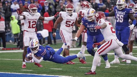 Neal scores go-ahead TD with 55 seconds left, KU holds on to beat No. 6 Oklahoma 38-33