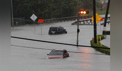 Nearly 200 million people in US are under heat, flood advisories