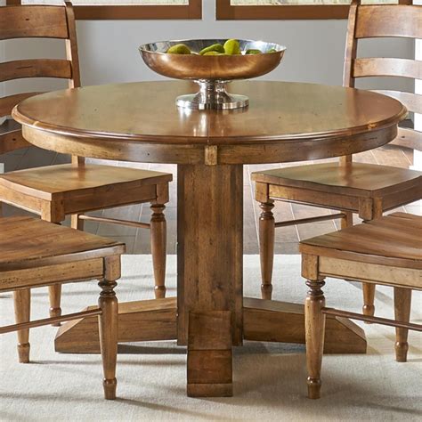 Gather around a beautiful dining table from NFM! Our collection of dining tables features a wide range of designs, sizes, and materials to fit any decor and lifestyle. From classic wood finishes to modern glass and metal designs, we've got everything you need to create a functional and stylish dining space.. 