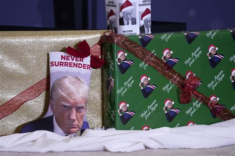 Need last-minute gifts? Presidential hopefuls offer ornaments, gift wrap  –  and Trump mug shot merch