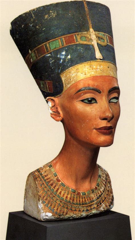 This small, painted votive statue depicts the Pharaoh Akhenaten and his Great Wife Nefertiti holding hands (a notedly unusual pose in New Kingdom artwork). The king wears the blue "kheperesh" crown, and the queen sports the flat-topped blue crown that has become associated with her image. In keeping with the typical Amarna Period ….