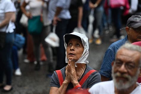 Neither rain nor shine stop ebullient Venezuelans from voting in opposition’s presidential primary