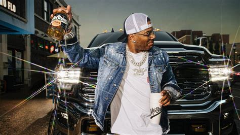 Nelly's new 'MoShine' moonshine mixes business and pleasure