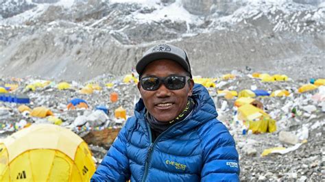 Nepal’s Sherpa guide regains title for most climbs of Mount Everest after 27th trip