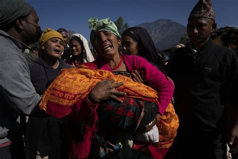 Nepal villagers cremate loved ones who perished in earthquake that shook its northwest, killing 157