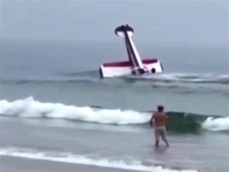 New Hampshire beachgoers witness small plane crash into surf, flip in water