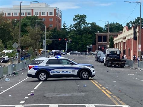 New details emerge in Boston mass shooting: Police charge 4 in connection with morning melee, and at least 4 more in other incidents