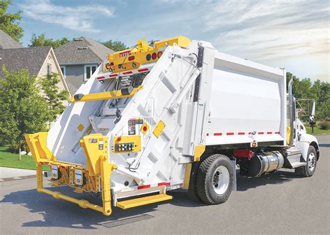 New garbage trucks for sale.  Quality waste management fleet with rear...