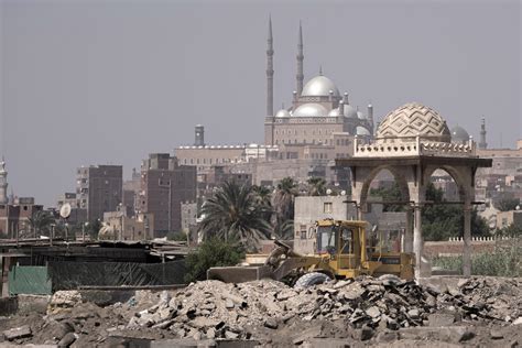 New highways carve into Cairo’s City of the Dead cemetery as Egypt’s government reshapes the city