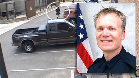 New video shows Denver officer ambushed and shot in patrol car