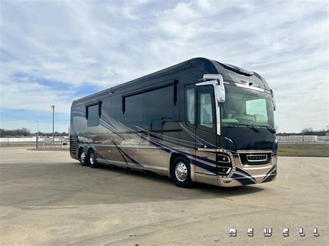 Like all Newell motor coaches, the P50 is designed for first class living. The smooth tile floors, the leather-bound walls and surround sound home theater system ensures the buyer will never sacrifice the luxury touches of the sticks and bricks they left behind. The kitchen has two cooktops: enough room for your personal chef!. 
