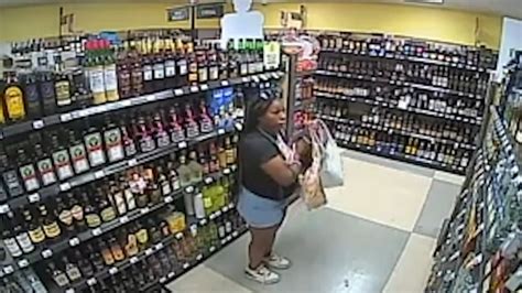 Newly released surveillance video shows Ta’Kiya Young inside store then encountering police before fatal shooting